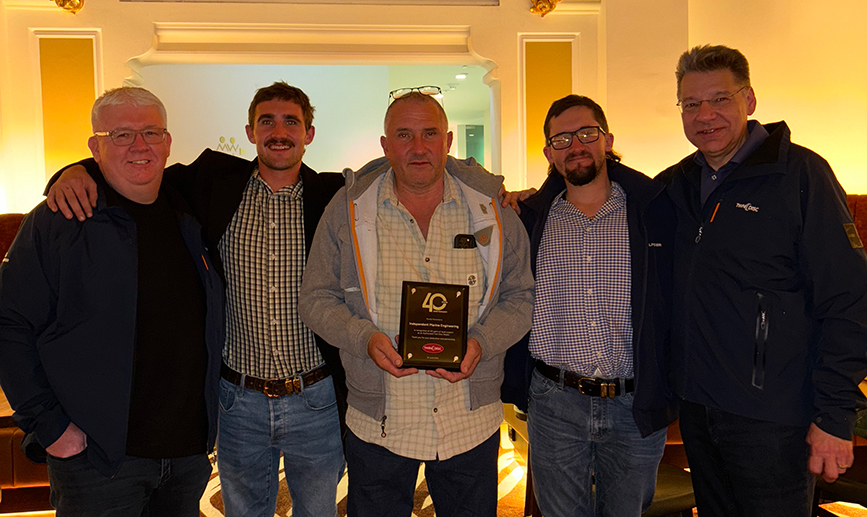 Twin Disc Pacific representatives with Independent Marine Engineering, excepting 40 years plaque